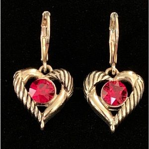 Napier gold tone heart lever back earrings with red crystal